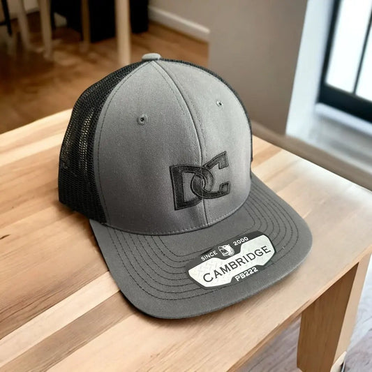 DESOTO CENTRAL - BLACK LOGO TRUCKER HAT PrinthouseOB